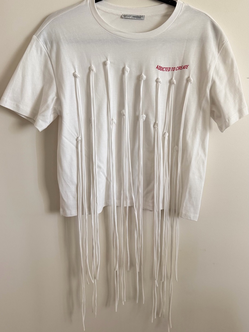 Zara White Knotted Fringe Tee with Red Script